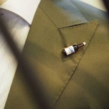 Close-up of a jacket lapel with a buttonhole.