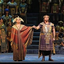 An operatic stage performance representing works such as Tosca and Aida