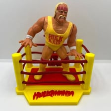 Hulk Hogan performing in a professional wrestling ring.