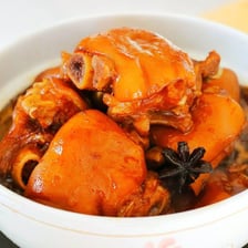 A dish made from cooked pig trotters, or pigs’ feet.