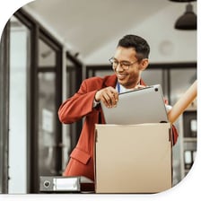 A person leaving a workplace after resigning