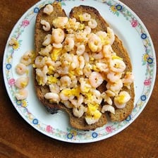 A serving of traditional potted shrimps in spiced butter