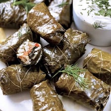 A plate of stuffed vine leaves.