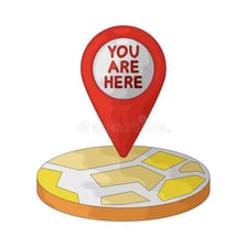 A person pointing to a specific location on a map.