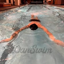 A swimmer keeping themselves afloat in open water