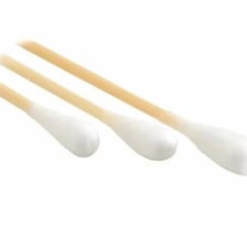 A sterile cotton swab used in a surgical setting