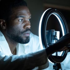 A person visibly absorbed and captivated by what they are seeing