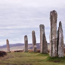 A large prehistoric standing stone forming part of a monument.