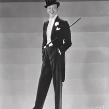 A formal top hat worn with a tailcoat