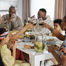 A person eating a meal at a table