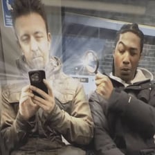 A person taking a quick look at a phone.