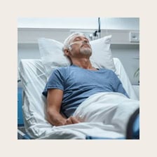 A hospital patient resting after being sedated.