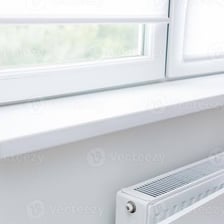 The horizontal ledge at the bottom of an interior window.