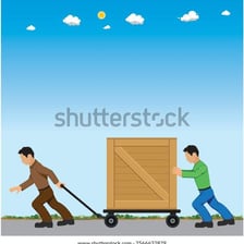 A person pulling a heavy box across a floor