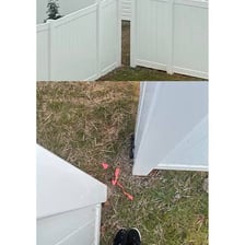 An opening between two sections of a fence.
