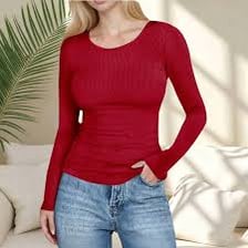 A person wearing a close-fitting sweater.