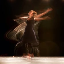 A dancer captured while spinning