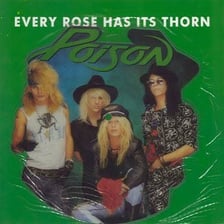 Poison performing on stage