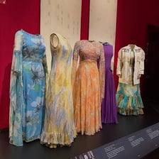 An elegant dress displayed on a clothing form