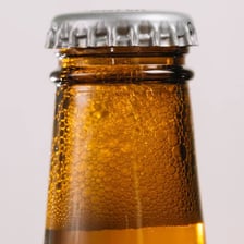 A threaded screw cap fitted onto a bottle.
