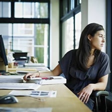 A person distracted and lingering instead of completing work
