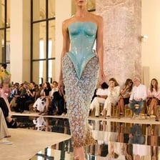 Fashion models walking down a runway