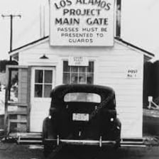 A sign or landmark identifying Los Alamos, New Mexico.