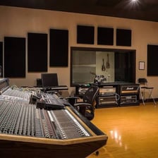 Vinyl records and music equipment associated with a record label