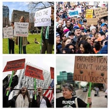 A protester holding a sign opposing a policy
