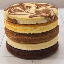 A cake arranged in several visible tiers