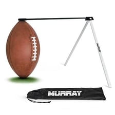 A football kicker launching a ball from a tee.