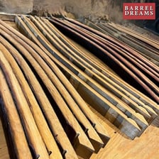 Individual wooden staves forming the side of a barrel