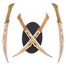 Several short daggers with pointed blades.