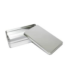 Several small metal tins