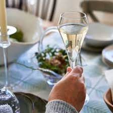 Tall flute glass filled with champagne