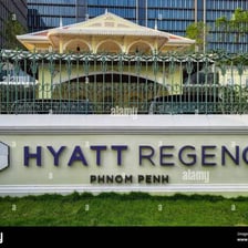 A Hyatt hotel building with its sign visible