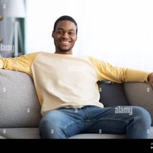 A person seated on a couch