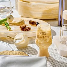 A salt cellar on a dining table, representing the French word sel.
