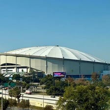 A large stadium topped by a rounded dome