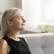 A person detecting a scent in the air