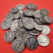 Several U.S. dime coins among loose change.
