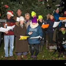 Singers performing a traditional Christmas carol