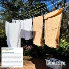 A clothesline drooping between two supports.