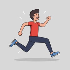 A runner moving vigorously outdoors