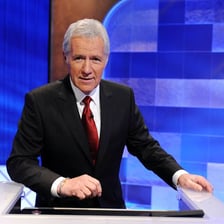 Alex Trebek hosting the television quiz show Jeopardy!