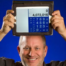 A person calculating a sum with numbers.
