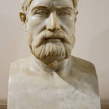 An artistic bust or portrait representing the ancient Greek poet Pindar.