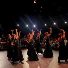 A dancer performing with energetic style and confidence.