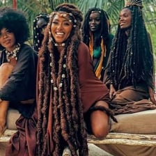 Person with dreadlocks associated with Rastafarian culture.