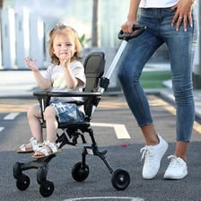 A toddler seated in a stroller
